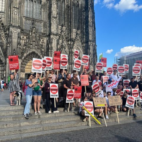 German Writers Unite in Solidarity at Cologne Cathedral Protest: “We Are Today… WGA!”